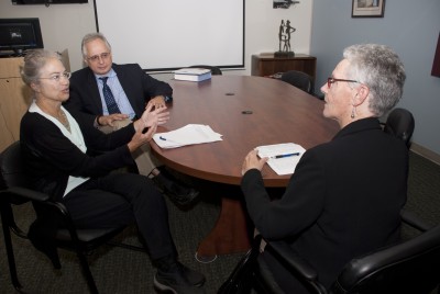 From left: Drs. Gail Sullivan and George Kuchel from the UConn Center on Aging discuss geriatric research, education and clinical care with Connecticut Department on Aging Commissioner Elizabeth Ritter. (Janine Gelineau/UConn Health)